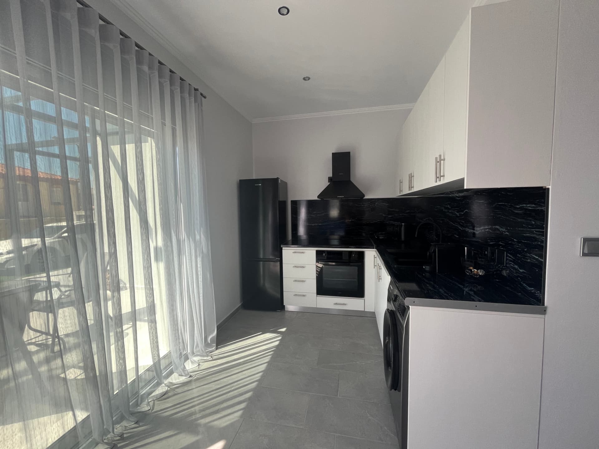 Fully equipped kitchen with modern appliances