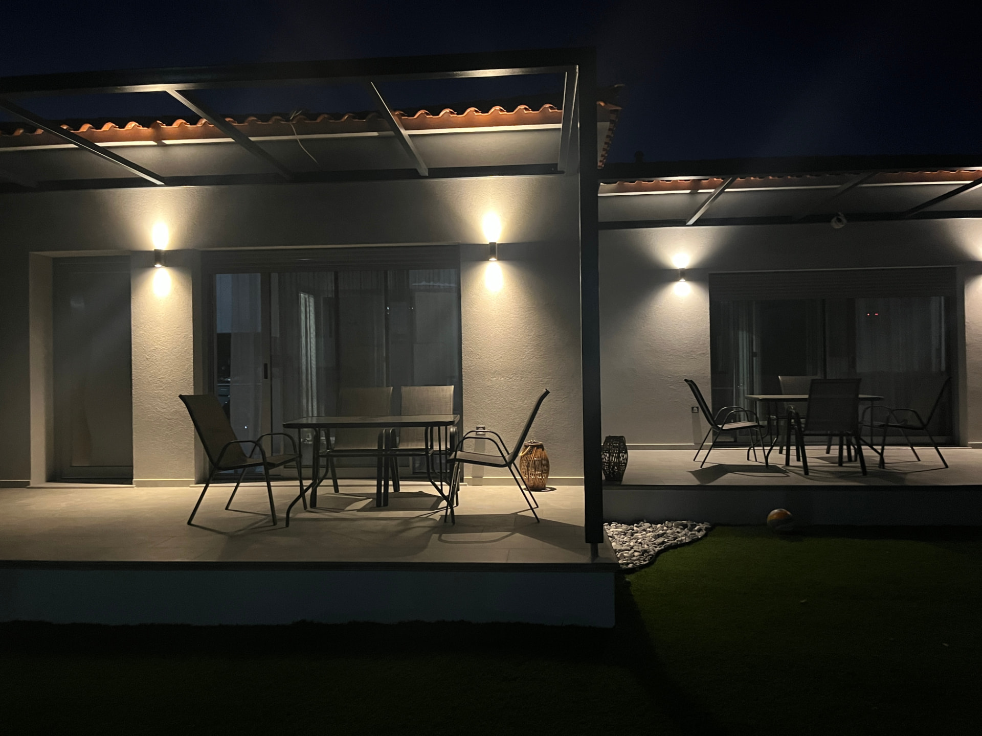 The verandas of Raki Boutique Homes at night